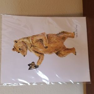 Bear holding butterfly print